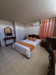 Postel nebo postele na pokoji v ubytování Hotel Khalifa