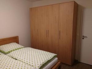 Postel nebo postele na pokoji v ubytování Apartmán Praděd v Říčkách - Říčky v Orlických horách