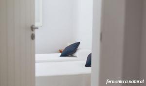 Posteľ alebo postele v izbe v ubytovaní Casas Emma y Sofía - Formentera Natural