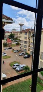 a view from a window of a parking lot at Zendo Suite in Nairobi