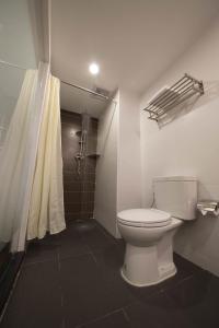 Koupelna v ubytování Chiang Roi 7 Days Inn