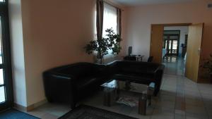 Posezení v ubytování Hotel Julianów