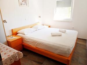 Posteľ alebo postele v izbe v ubytovaní Apartman Morjani
