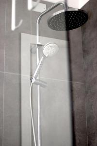 A bathroom at Outdooredo Garda Apartment