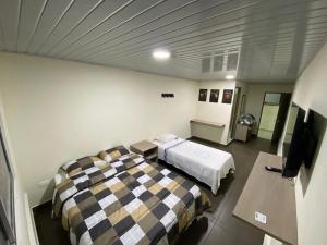 Letto o letti in una camera di Vivienda turística Arboleda de Cádiz