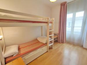 Posteľ alebo postele v izbe v ubytovaní Zénitude, T3, centre Luchon, wifi, casier à skis, ascenseur, 6 personnes