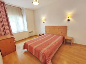 Posteľ alebo postele v izbe v ubytovaní Zénitude, T3, centre Luchon, wifi, casier à skis, ascenseur, 6 personnes