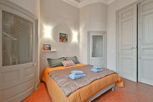 Posteľ alebo postele v izbe v ubytovaní Le Vieux Sextier - AC Clim - Lumineux - WIFI - Hypercentre