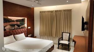 A bed or beds in a room at RBS Hotel & Restaurant 5 mint walking distance from Ram Janam Bhumi