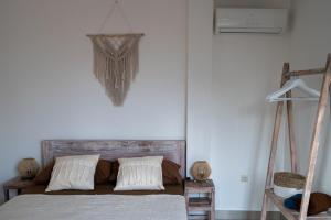 Postel nebo postele na pokoji v ubytování Surf Bali Villa