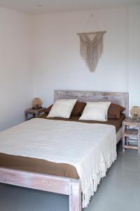 Postel nebo postele na pokoji v ubytování Surf Bali Villa