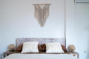 Postel nebo postele na pokoji v ubytování Surf Bali Villa