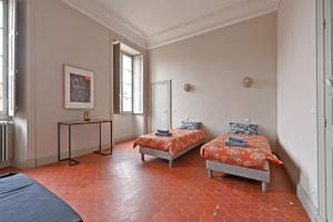 Posteľ alebo postele v izbe v ubytovaní Le Vieux Sextier - AC Clim - Lumineux - WIFI - Hypercentre