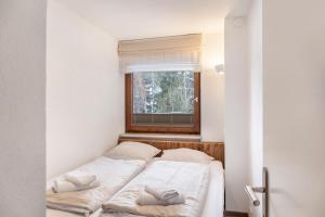 Posteľ alebo postele v izbe v ubytovaní Haus Excelsior Top 20