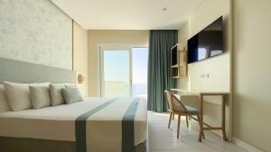 TV a/nebo společenská místnost v ubytování Hotel Giosue' a mare Sorrento