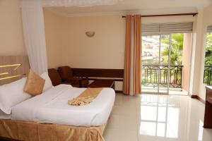Meru Slopes Hotel客房内的一张或多张床位