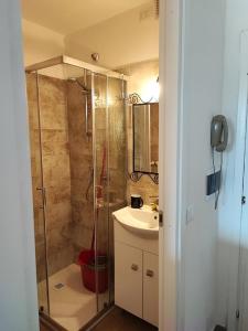 a bathroom with a shower and a sink at La Casa di Giorgia in Sestriere