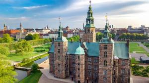 an old castle with a city in the background at Scandinavian Style 3BR in Copenhagen City Centre in Copenhagen