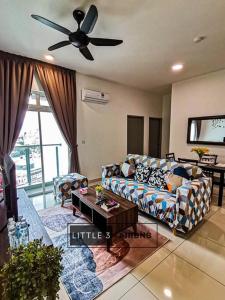 a living room with a couch and a ceiling fan at 3R2B Near Titiwangsa Station PWTC HKL KLCC IJM TRA115 in Kuala Lumpur