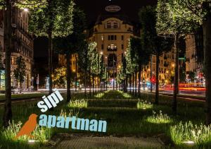 Κήπος έξω από το Sipi Apartman