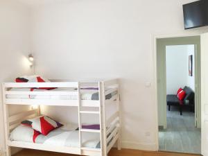 Posteľ alebo postele v izbe v ubytovaní Appartements Sun, parking, centre ville , proche Sanctuaires