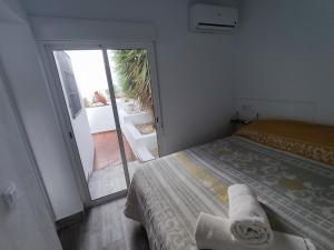 Posteľ alebo postele v izbe v ubytovaní Casita del Molino