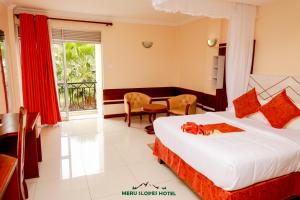 Meru Slopes Hotel客房内的一张或多张床位
