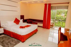 Meru Slopes Hotel客房内的一张或多张床位