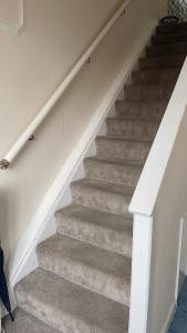 a set of stairs in a house at Spacious Double Room in Leicester