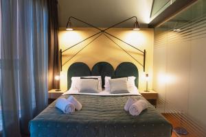 Łóżko lub łóżka w pokoju w obiekcie Italianflat - Empireo Rooms - 200mt to Arena