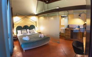 Łóżko lub łóżka w pokoju w obiekcie Italianflat - Empireo Rooms - 200mt to Arena