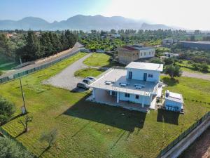 an aerial view of a house on a grass field at Cà del Re Holiday in Partinico