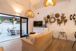 Μια τηλεόραση ή/και κέντρο ψυχαγωγίας στο Vila Fresca Apartment