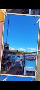 a view from a window of a building with a blue sky at Triunfo Flat in Triunfo
