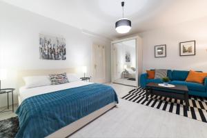 Posteľ alebo postele v izbe v ubytovaní Angela Luxury Studio Apartment