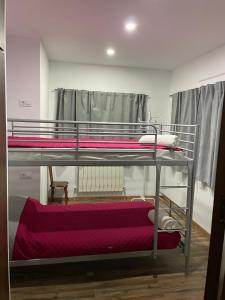Postel nebo postele na pokoji v ubytování Apartamentos el soho
