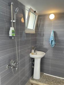 a bathroom with a sink and a shower at Grandmother's House in Famagusta +58 photos