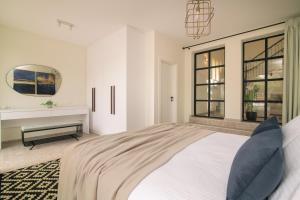 Posteľ alebo postele v izbe v ubytovaní Kaletzia villas
