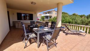 A balcony or terrace at ES GANXO HOUSE PORTO CRISTO