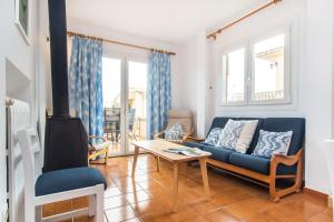 A seating area at ES GANXO HOUSE PORTO CRISTO