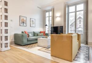 TV a/nebo společenská místnost v ubytování Superior apartment in the historic city center by REMS