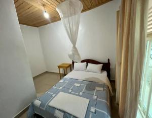 Ein Bett oder Betten in einem Zimmer der Unterkunft SKYLIGHT VILLA