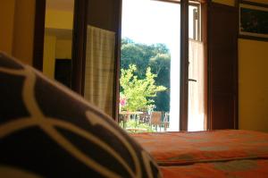 Łóżko lub łóżka w pokoju w obiekcie Hotel Posada San Marcos, Alájar