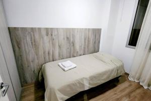 Una cama o camas en una habitación de Aires Verdes