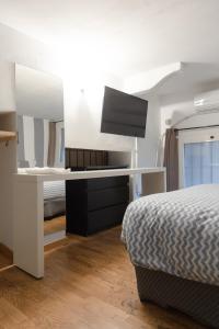 En eller flere senge i et værelse på BAGNO PRIVATO - stanza doppia
