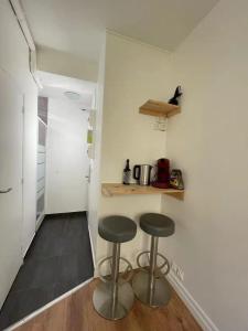 Kuchnia lub aneks kuchenny w obiekcie Studio paisible Paris 20