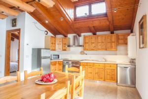 Kuchyň nebo kuchyňský kout v ubytování Albergo Diffuso Dolomiti