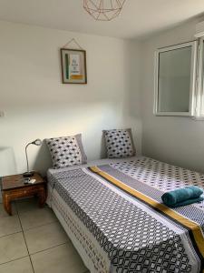 Postel nebo postele na pokoji v ubytování hauts vallons appartement full équipé 3 chambres