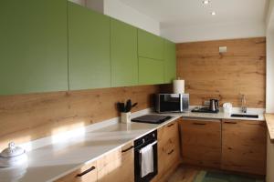 Η κουζίνα ή μικρή κουζίνα στο Relais Dolomiti Appartamento