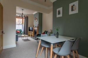 a living room with a table and chairs at Milton Stays - Cosy Home in Central York for 6 With On Street Parking in York
